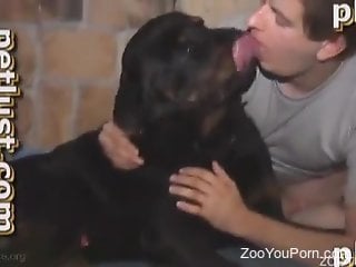 Horny dude deepthroats the dog's cock in insane modes